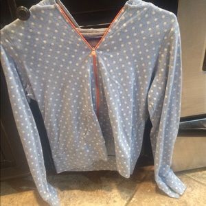 Girls blue and white polka-dot zip-up hoodie.